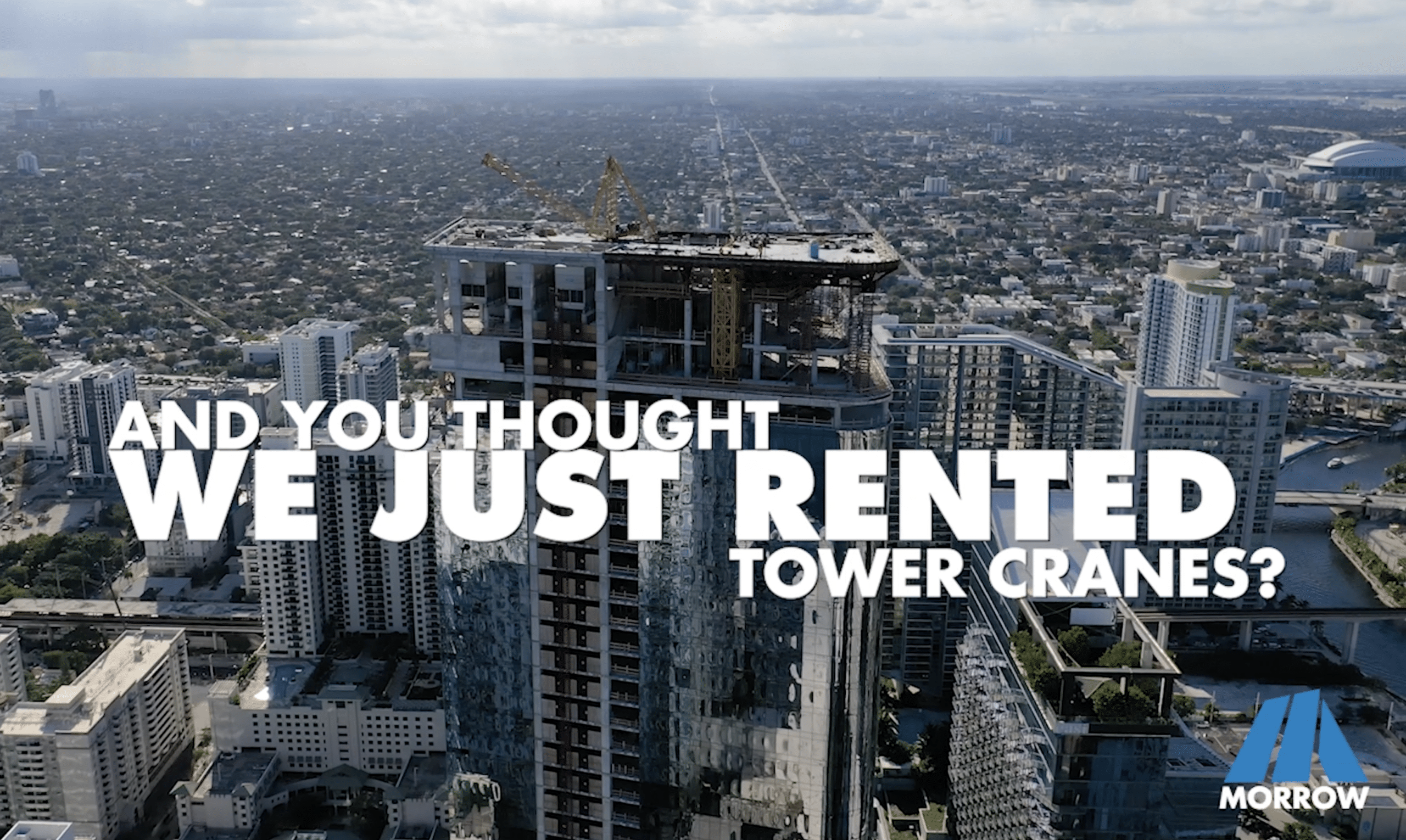 High-rise construction view with Morrow logo and text.